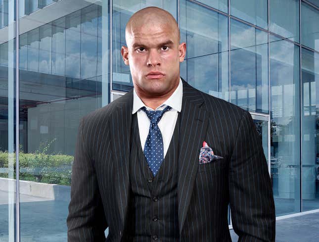 Image for article titled Jacked Guy Wearing Suit Must Have It All Figured Out