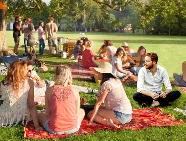 Image for article titled Man Who Didn’t Bring Picnic Blanket Sits Ashamedly On Ground Next To Everyone