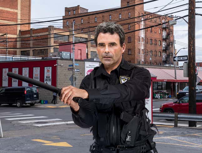 Image for article titled Cop Holding Baton Like He A Jedi