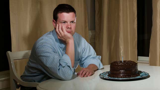 Image for article titled Completely Alone Man Really Thought Blowing Out Birthday Candle In Dark Apartment Would Have Cheered Him Up